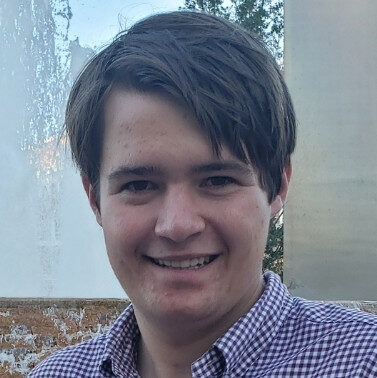 cropped-Lawton-Brinkman_Headshot